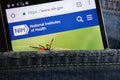 National Institutes of Health NIH website displayed on smartphone hidden in jeans pocket