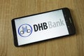 Demir-Halk Bank DHB logo displayed on smartphone