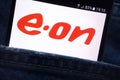 E.ON website displayed on smartphone hidden in jeans pocket
