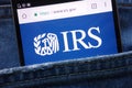 IRS Internal Revenue Service website displayed on smartphone hidden in jeans pocket