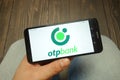 KONSKIE, POLAND - 05 MAY, 2019: OTP Bank Group logo displayed on smartphone