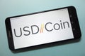 USD Coin USDC cryptocurrency logo displayed on smartphone