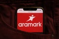 KONSKIE, POLAND - September 04, 2021: Aramark Corporation logo on mobile phone hidden in jeans pocket Royalty Free Stock Photo