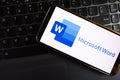 KONSKIE, POLAND - September 17, 2022: Microsoft Word logo displayed on smartphone in the office. Microsoft Word is a word Royalty Free Stock Photo