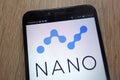 NANO cryptocurrency logo displayed on a modern smartphone