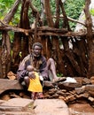 Konso aka Xonsita tribe man with baby - 03 october 2012 , Omo valley, Ethiopia