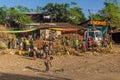 KONSO, ETHIOPIA - FEBRUARY 7, 2020: People on a pile of harvested corn in Konso, Ethiop