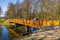 Konstancin-Jeziorna, Poland - Early spring forest and water ponds landscape with wooden footbridge in Konstancin-Jeziorna Springs