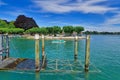 Konstanz, Germany: Harbor of lake Constance with canoes and people relaxing on sunny summer day Royalty Free Stock Photo