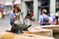 Konstanz, Germany, Part of fountain called `Kaiserbrunnen` with satiric sculpture of a pigeon wearing a bishop`s mitre