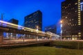 A modern tramway passing on a bridge in Haag