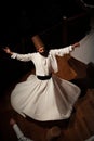 Whirling Dervish | Semazen performing Sama ritual on stage Royalty Free Stock Photo