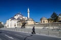 An old man is walking on the street near Mevlana Celaleddin-i Rumi Tomb