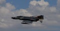 Fighter jet aircraft of Turkish Air Force with blue cloudy sky background. Copy space Royalty Free Stock Photo