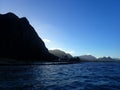 Koolau Mountains with last light of day streaming towards water Royalty Free Stock Photo