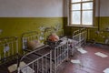 Bedroom in abandoned kindergarten in destroyed village of Kopachi 10 km exclusion zone of Chernobyl Nuclear Power Plant, Ukraine