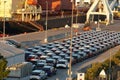 Recently discharged new cars are parking in port of Koper, Slovenia, ready to be drive in auto shops for costumers.