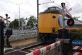 Koploper intercity train at closed railway crossing at Zoetermeer Oost railway station