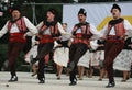 People in traditional folk costume of The National Folklore Fair in Koprivshtica Royalty Free Stock Photo