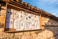 Funeral announcements posted on a wooden notice board in Koprivshtitsa, Bulgaria Royalty Free Stock Photo