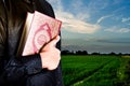 Koran in hand - holy book of Muslims  public item of all muslims Royalty Free Stock Photo