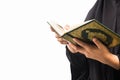 Koran in hand - holy book of Muslims( public item of all muslims )Koran in hand muslims woman