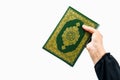 Koran in hand - holy book of Muslims( public item of all muslims )Koran in hand muslims woman Royalty Free Stock Photo