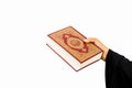 Koran in hand - holy book of Muslims women ( public item of all muslims ) Royalty Free Stock Photo