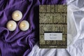 The Koran, the holy book of Islam, surrounded by three burning candles Royalty Free Stock Photo