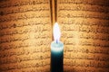 Koran or quran holy book with candle on candlelight Royalty Free Stock Photo