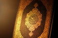 Koran or quran holy book on candlelight Royalty Free Stock Photo