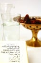 Koran with water and dates