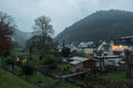 Kordel, Rhineland-Palatinate - Germany - 04 14 2019 - Foggy view over the backyards, gardens and traditional houses in the Kyll