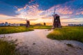 Korea landscape Beautiful sunset and traditional windmills, incheon South Korea, Sorae ecology wetland park Royalty Free Stock Photo