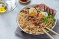 A bowl with ramen, an Asian noodle soup