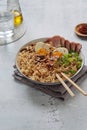 A bowl with ramen, an Asian noodle soup