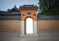 Korea Vintage Gateway and traditional vintage wall with the light inside the door
