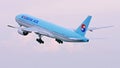 Korean Air plane flying up in the sky