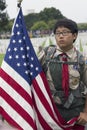 Korean American Boyscout and US Flag at 2014 Memorial Day Event, Los Angeles National Cemetery, California, USA