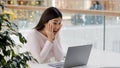 Korean Asian happy woman with laptop excited surprised holding head with hands got scholarship win online auction