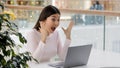 Korean Asian happy woman with laptop excited surprised scream yelling got university scholarship win online auction