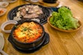 Korean Barbecue, where you could grill your own selected meat, and have side dishes such as the kimchi soup. Royalty Free Stock Photo