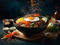 Korean bibimbap, floating, popular rice bowl dish made with cooked rice, vegetables, meat, fried egg