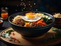 Korean bibimbap, floating, popular rice bowl dish made with cooked rice, vegetables, meat, fried egg