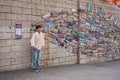 Korean boy near art wall in Gamcheon Culture Village Royalty Free Stock Photo