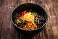 Korean cold soup kuksi with vegetables and beef Royalty Free Stock Photo