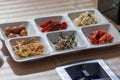A Korean dish of anchovies and other spicy foods.