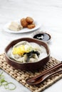 Korean Dumpling and Slice Rice Cake Soup Mandu Tteok Guk, Traditional Soup for Festive Occasion Royalty Free Stock Photo