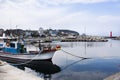 Korean fisher people floating stop fishery fishing ship boat moor on jetty in east japan sea ocean waiting catch fish marine life Royalty Free Stock Photo