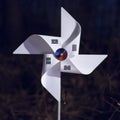 The Korean flag shaped like a pinwheel in the forest at dark night